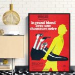 displays the tall blond with a black shoe