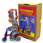 vintage toy elephant on tricycle