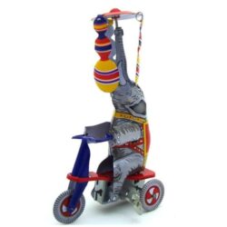 vintage toy elephant on tricycle