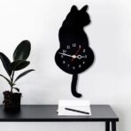 clock cat tail pendulum