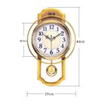 vintage wall clock with pendulum