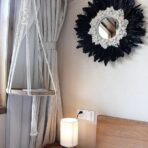 feather round mirror