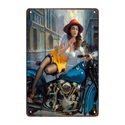 metal plaque advertising motorcycle with woman