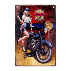 metal plaque advertising motorcycle with woman on it